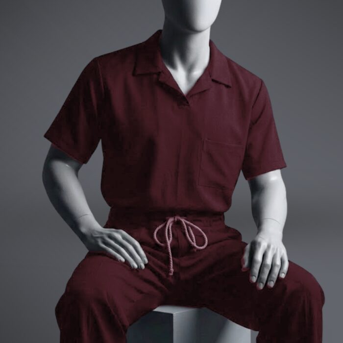A stylish maroon t shirt scrub view on a sitting mannequin