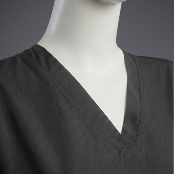V-neck scrub black close up A close up photo of a fashionable black minimal scrub on a mannequin.
