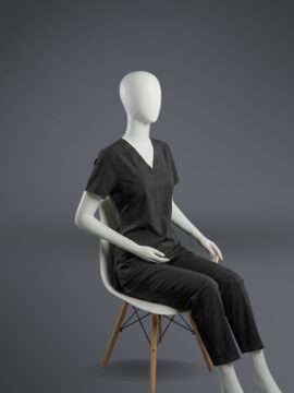 A stylish black minimal scrub with on a sitting mannequin.